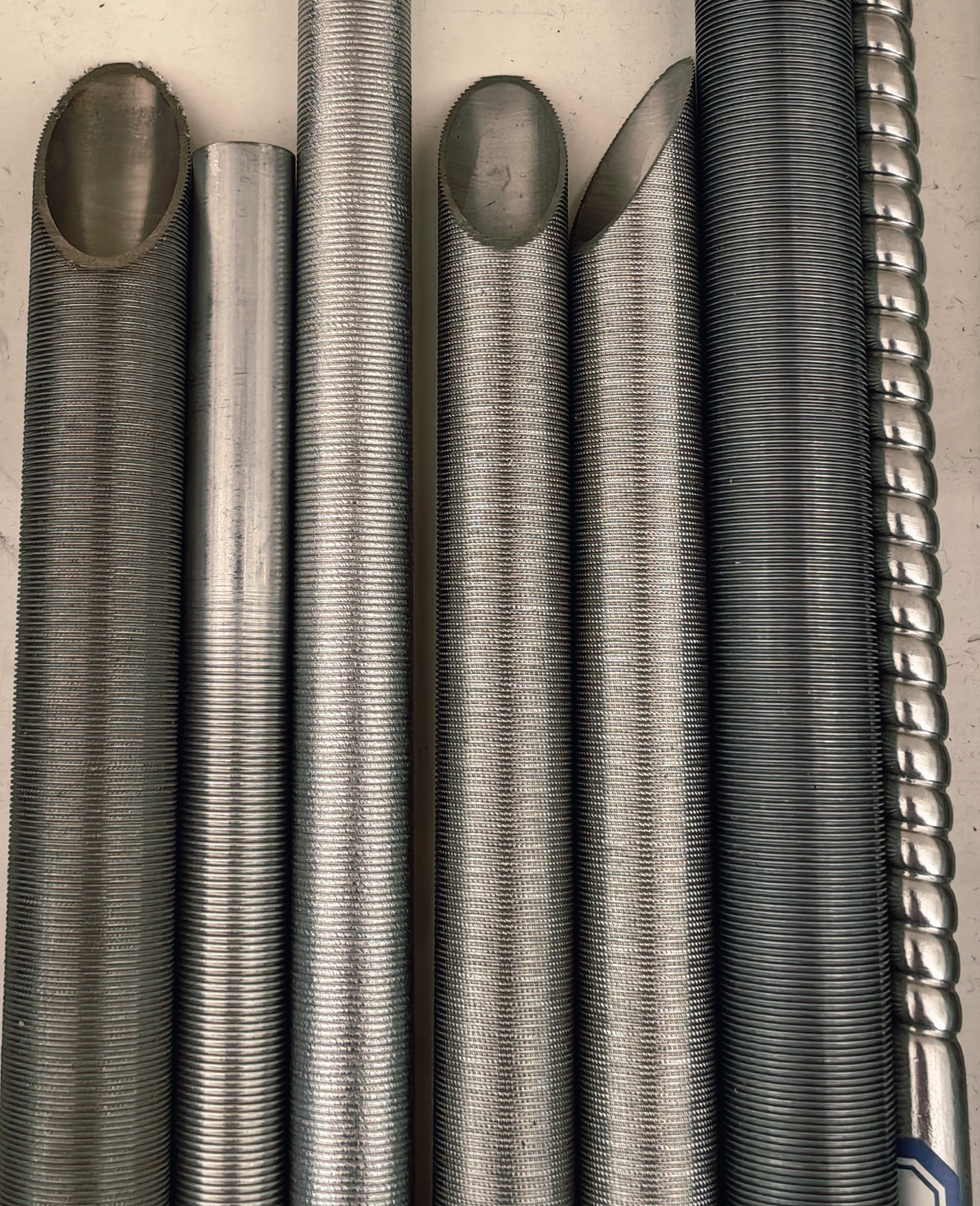 Titanium low fin tube for seawater cooling condenser and corrosion resistant heat exchanger applications
