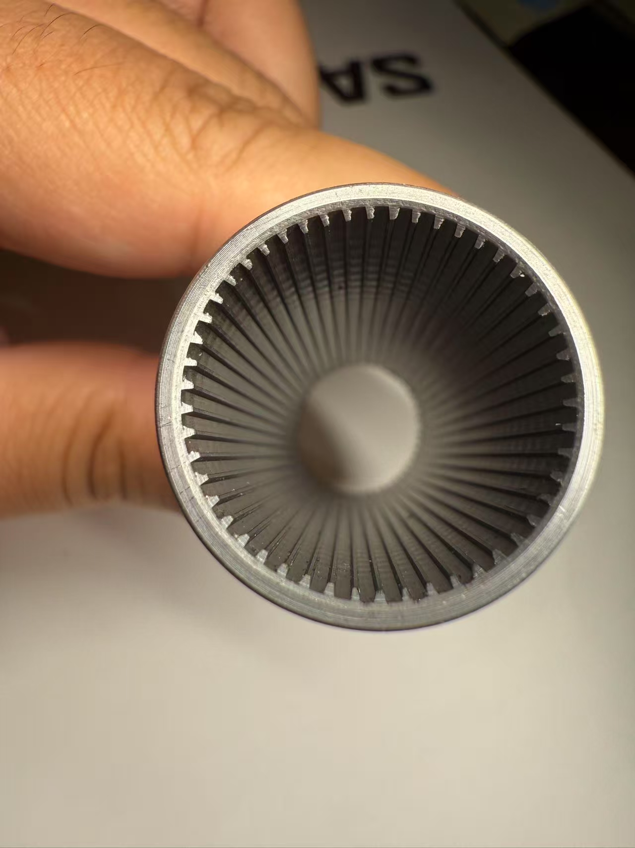 Cross section of inner grooved tube showing internal groove profile