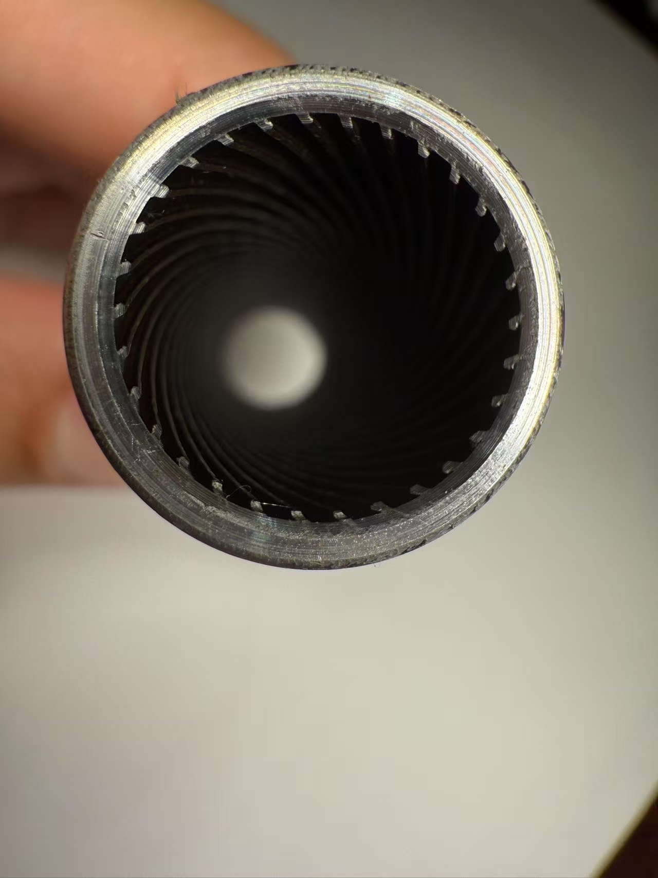 Internally grooved tube tooth shape and groove geometry close-up