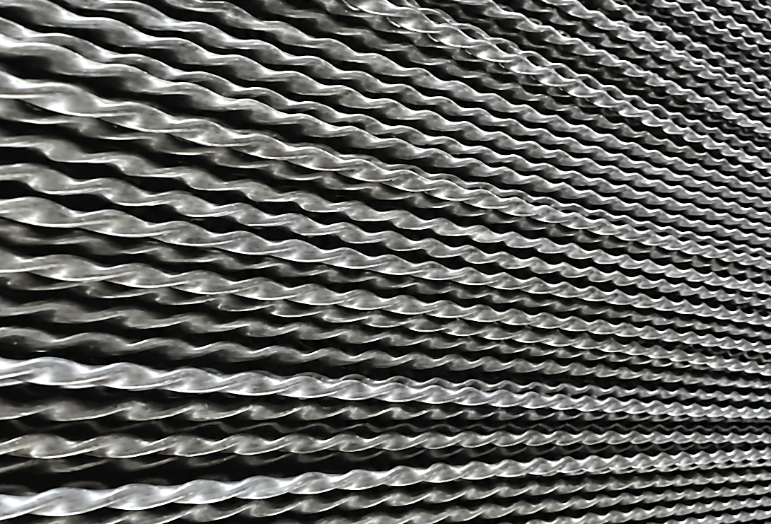 Titanium twisted tube with special enhanced heat transfer geometry for heat exchanger review