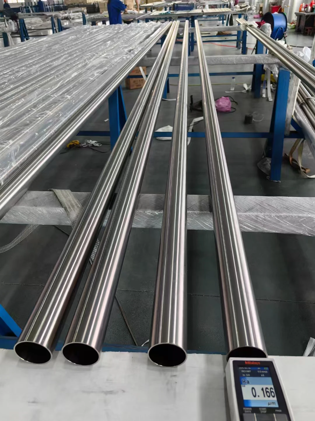 Metal tubes and a surface roughness tester in the workshop