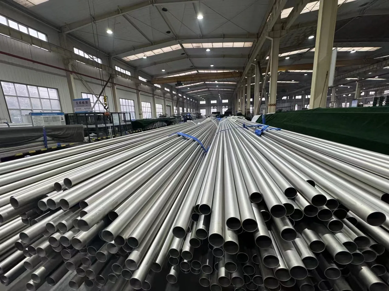 Metal tubes arranged in the GAOFA TECH workshop